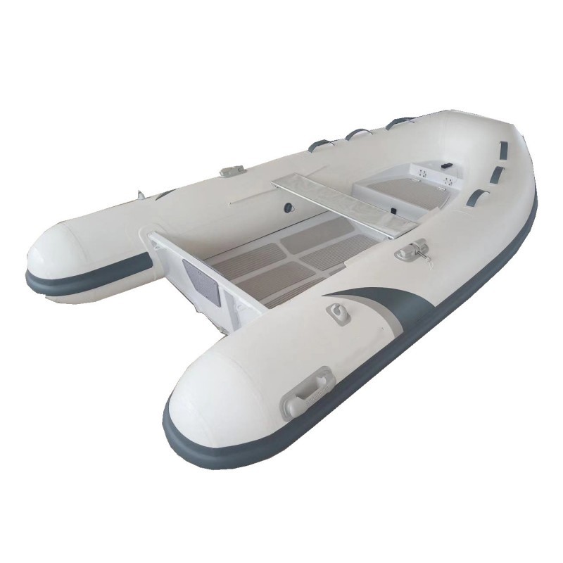 Rigid bottom inflatable dinghy and rigid aluminum inflatable tender